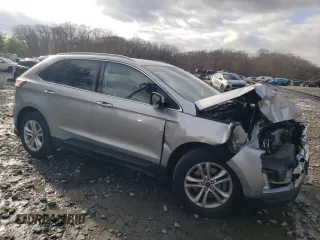 2020 Ford Edge SEL z VIN 2FMPK4J95LBA29912, wystawiony jako Copart lot #82968534 z przebiegiem 104 083 mil mil oraz Szkoda całkowita • Salvage title. Historia ofert i sprzedaży dostępna na DreamBid. Obrazek 4.