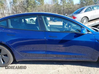 2022 Tesla Model 3 Long Range with VIN 5YJ3E1EB1NF257059, listed as a IAAI auction lot 41329318 with 30,652 mi miles and . Bid and sale history available at DreamBid. Image 13.