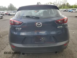 2018 Mazda CX-3 Sport z VIN JM1DKFB79J1323497, wystawiony jako Copart lot #56168875 z przebiegiem 60 284 mil mil oraz Szkoda całkowita • Salvage title. Historia ofert i sprzedaży dostępna na DreamBid. Obrazek 6.