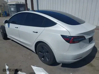 2023 Tesla Model 3 with VIN 5YJ3E1EA6PF405491, listed as a IAAI auction lot 41851797 with 47,581 mi miles. Bid and sale history available at carsss.com. Image 3.