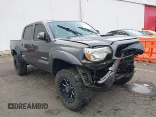 2014 Toyota Tacoma with VIN 3TMLU4ENXEM139294, listed as a IAAI auction lot 40632741 with 256,990 mi miles. Bid and sale history available at carsss.com. Image 1.