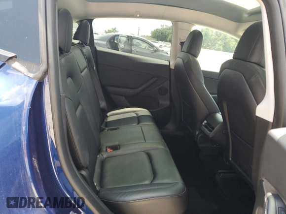 2022 Tesla Model Y Long Range z VIN 7SAYGDEE7NF313228, wystawiony jako Copart lot #55060705 z przebiegiem 32 238 mil mil oraz Szkoda całkowita • Salvage title. Historia ofert i sprzedaży dostępna na DreamBid. Obrazek 11.