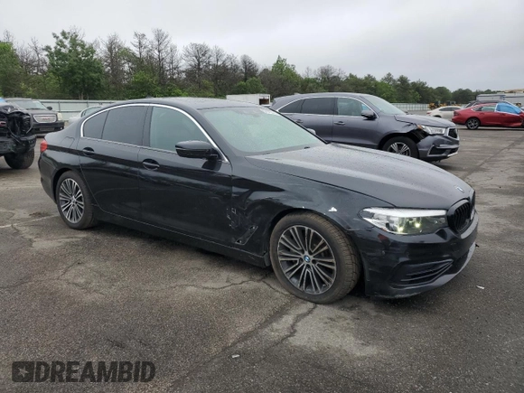 2019 BMW 5 Series 540i xDrive with VIN WBAJE7C54KWW19994, listed as a Copart auction lot 57973055 with 121,995 mi miles and Salvage title. Bid and sale history available at DreamBid. Image 4.