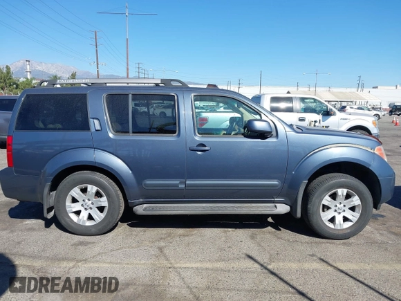2005 Nissan Pathfinder SE with VIN 5N1AR18U05C741080, listed as a IAAI auction lot 40671277 with 215,693 mi miles. Bid and sale history available at carsss.com. Image 13.