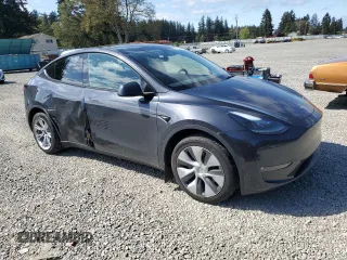 2024 Tesla Model Y Long Range with VIN 7SAYGAEE8RF987571, listed as a Copart auction lot 55110485 with 19,732 mi miles and Salvage title. Bid and sale history available at DreamBid. Image 4.