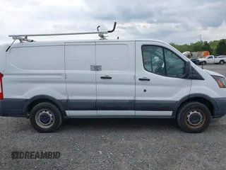 2016 Ford Transit Cargo with VIN 1FTYE1ZM8GKA63622, listed as a IAAI auction lot 41887397 with 153,206 mi miles and . Bid and sale history available at carsss.com. Image 13.