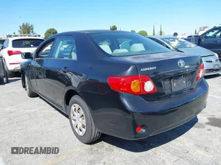 2009 Toyota Corolla with VIN JTDBL40E199094885, listed as a IAAI auction lot 41840789 with 106,498 mi miles. Bid and sale history available at carsss.com. Image 3.