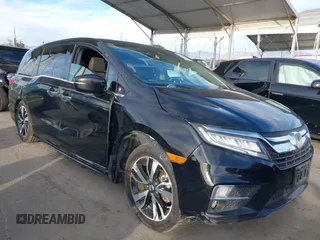 2018 Honda Odyssey Elite z VIN 5FNRL6H90JB064000, wystawiony jako IAAI lot #41323808 z przebiegiem Nie podano mil oraz . Historia ofert i sprzedaży dostępna na DreamBid. Obrazek 1.
