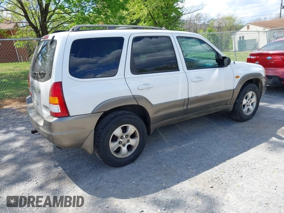 2001 Mazda Tribute LX with VIN 4F2YU09131KM12857, listed as a IAAI auction lot 42034605 with 257,015 mi miles and . Bid and sale history available at carsss.com. Image 4.