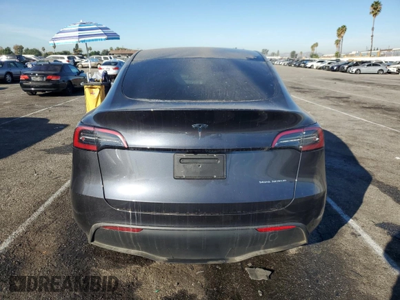 2024 Tesla Model Y Long Range с VIN 7SAYGDEE3RA236473, выставлен на аукционе Copart как лот 77409334 с пробегом 5 822 миль миль и Списание • Salvage title. История ставок и продаж доступна на DreamBid. Изображение 6.