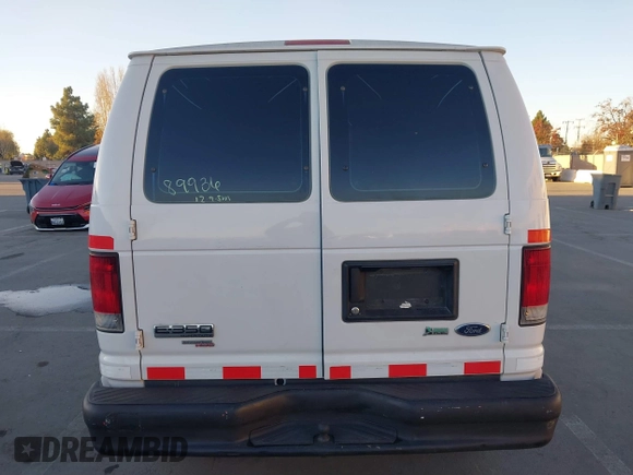 2012 Ford Econoline Cargo Super Duty Commercial with VIN 1FTSE3EL8CDB13903, listed as a IAAI auction lot 41060058 with 129,579 mi miles and . Bid and sale history available at carsss.com. Image 16.