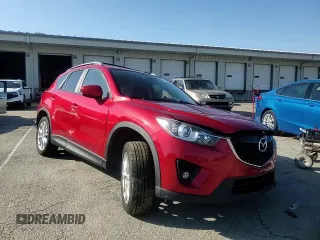 2014 Mazda CX-5 Grand Touring with VIN JM3KE4DY9E0419111, listed as a Copart auction lot 52250315 with 130,003 mi miles and Salvage Title. Bid and sale history available at DreamBid. Image 12.
