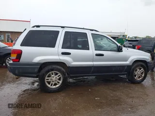 2004 Jeep Grand Cherokee Laredo z VIN 1J4GW48S64C132172, wystawiony jako IAAI lot #42163524 z przebiegiem 170 952 mil mil oraz . Historia ofert i sprzedaży dostępna na DreamBid. Obrazek 13.
