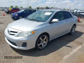 2011 Toyota Corolla L with VIN JTDBU4EE9B9156724, listed as a IAAI auction lot 42138344 with 96,486 mi miles and . Bid and sale history available at DreamBid. Image 2.