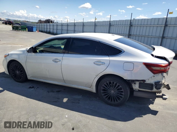 2016 Toyota Avalon Limited with VIN 4T1BK1EBXGU199365, listed as a Copart auction lot 51663095 with 141,066 mi miles and Salvage Title. Bid and sale history available at DreamBid. Image 2.