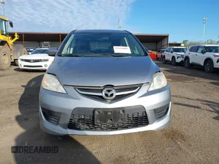 2010 Mazda 5 Sport with VIN JM1CR2W36A0388353, listed as a IAAI auction lot 42121004 with 169,658 mi miles. Bid and sale history available at carsss.com. Image 6.