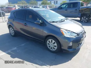 2014 Toyota Prius One with VIN JTDKDTB33E1061088, listed as a IAAI auction lot 42040762 with 206,735 mi miles and . Bid and sale history available at DreamBid. Image 1.