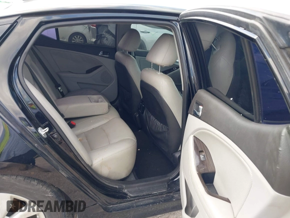 2015 Kia Optima EX with VIN 5XXGN4A75FG357829, listed as a IAAI auction lot 42302163 with 115,277 mi miles and . Bid and sale history available at DreamBid. Image 8.