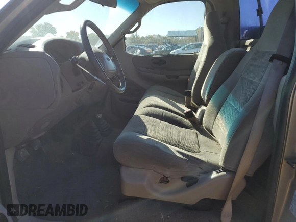 2001 Ford F-150 XL with VIN 1FTRF18W71NB69621, listed as a Copart auction lot 77816954 with Not provided miles and Salvage title. Bid and sale history available at DreamBid. Image 7.