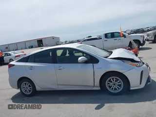 2020 Toyota Prius L Eco with VIN JTDKARFU5L3117287, listed as a IAAI auction lot 42202426 with 122,870 mi miles and . Bid and sale history available at DreamBid. Image 13.