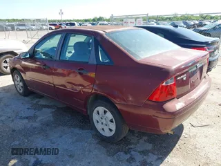 2007 Ford Focus S with VIN 1FAFP34N77W297780, listed as a IAAI auction lot 42074788 with 153,441 mi miles and . Bid and sale history available at carsss.com. Image 3.