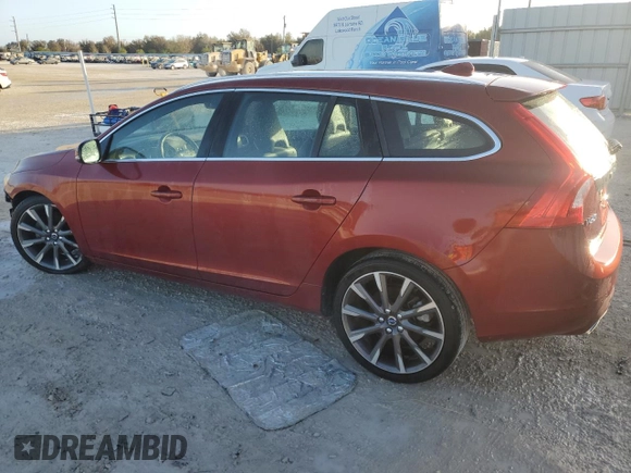 2015 Volvo V60 T5 Drive-E Premier with VIN YV140MEK7F1264851, listed as a Copart auction lot 77811154 with 65,711 mi miles and Salvage Title. Bid and sale history available at carsss.com. Image 2.