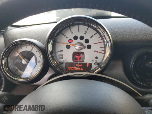 2014 MINI Convertible S with VIN WMWZP3C55ET706573, listed as a Copart auction lot 52325705 with 125,076 mi miles and Salvage Title. Bid and sale history available at DreamBid. Image 9.