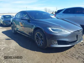 2020 Tesla Model S Long Range with VIN 5YJSA1E23LF414529, listed as a IAAI auction lot 41678075 with 76,164 mi miles. Bid and sale history available at carsss.com. Image 1.
