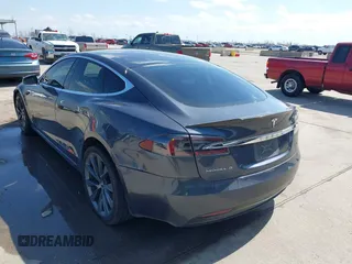 2017 Tesla Model S 100D with VIN 5YJSA1E29HF204881, listed as a IAAI auction lot 41785767 with 146,523 mi miles and . Bid and sale history available at DreamBid. Image 3.