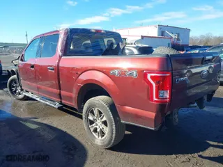 2015 Ford F-150 XLT w/HD Payload Pkg with VIN 1FTFW1EG9FFC44739, listed as a IAAI auction lot 41193582 with 121,169 mi miles. Bid and sale history available at carsss.com. Image 3.