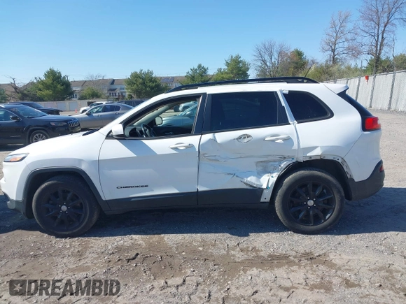 2014 Jeep Cherokee Latitude with VIN 1C4PJMCS9EW309289, listed as a IAAI auction lot 42003252 with 99,360 mi miles and . Bid and sale history available at DreamBid. Image 14.