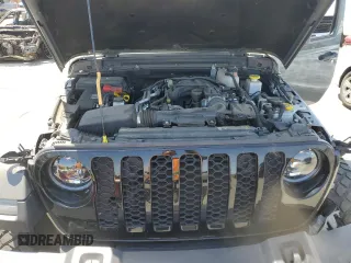 2023 Jeep Gladiator Sport S с VIN 1C6HJTAG3PL552959, выставлен на аукционе Copart как лот 56905635 с пробегом 30 356 миль миль и Списание • Salvage title. История ставок и продаж доступна на DreamBid. Изображение 11.