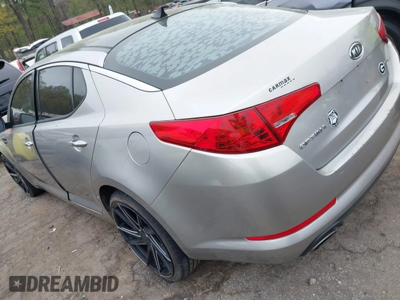 2012 Kia Optima EX with VIN 5XXGN4A73CG049005, listed as a IAAI auction lot 41912666 with 212,312 mi miles. Bid and sale history available at carsss.com. Image 3.