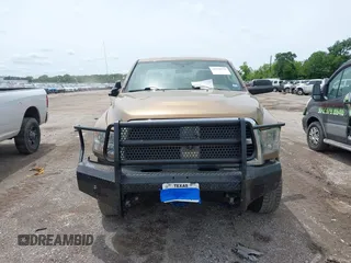 2012 Ram 2500 ST z VIN 3C6UD5CLXCG272362, wystawiony jako IAAI lot #42216175 z przebiegiem 217 984 mil mil oraz . Historia ofert i sprzedaży dostępna na DreamBid. Obrazek 12.