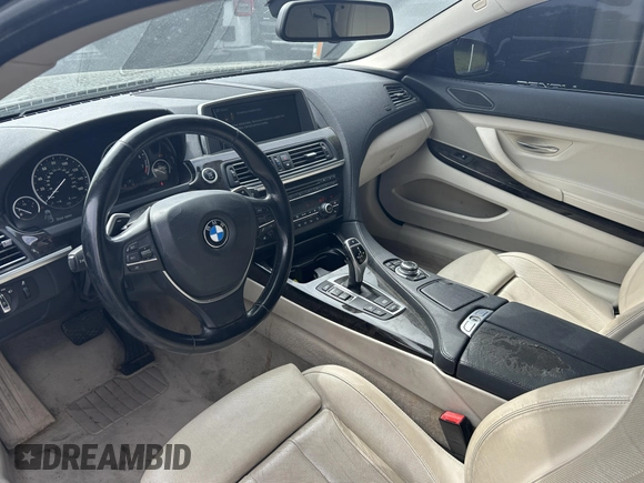 2012 BMW 6 Series 650i xDrive with VIN WBALX5C54CC894131, listed as a IAAI auction lot 42165498 with 82,800 mi miles. Bid and sale history available at carsss.com. Image 5.