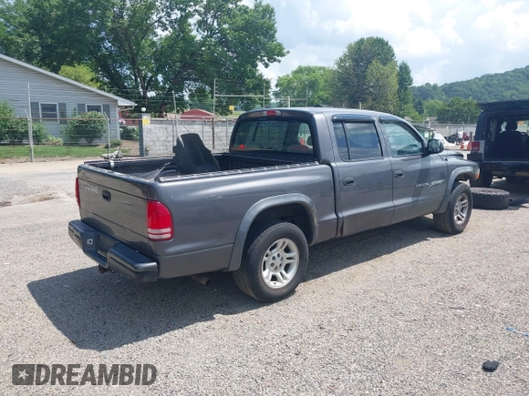 2001 Dodge Dakota with VIN 1B7HL2AX01S338909, listed as a IAAI auction lot 42639655 with 111,858 mi miles and . Bid and sale history available at DreamBid. Image 4.