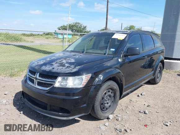2014 Dodge Journey SE with VIN 3C4PDCAB7ET116651, listed as a IAAI auction lot 42762513 with 197,808 mi miles and . Bid and sale history available at DreamBid. Image 6.