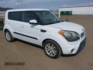 2012 Kia Soul + with VIN KNDJT2A62C7368475, listed as a IAAI auction lot 42103715 with 142,736 mi miles. Bid and sale history available at carsss.com. Image 1.