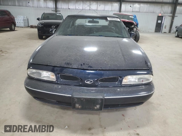 1998 Oldsmobile 88 LS z VIN 1G3HN52K5W4867072, wystawiony jako Copart lot #75689524 z przebiegiem 192 507 mil mil oraz Szkoda całkowita • Salvage title. Historia ofert i sprzedaży dostępna na DreamBid. Obrazek 5.