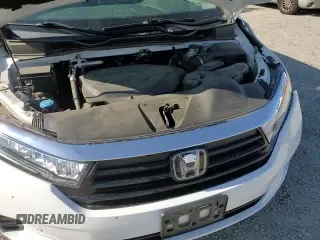 2021 Honda Odyssey Touring с VIN 5FNRL6H81MB032247, выставлен на аукционе Copart как лот 67250295 с пробегом 58 943 миль миль и Списание • Salvage title. История ставок и продаж доступна на DreamBid. Изображение 16.