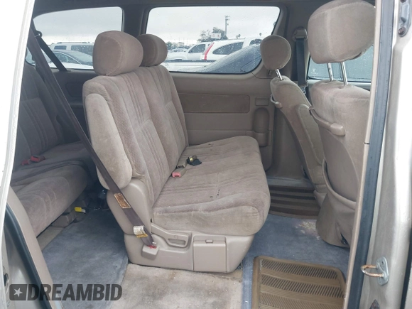 2001 Toyota Sienna CE with VIN 4T3ZF19C51U329489, listed as a IAAI auction lot 41535721 with 218,839 mi miles. Bid and sale history available at carsss.com. Image 8.