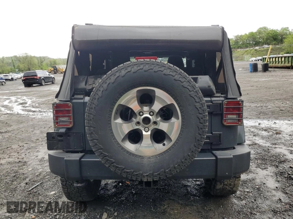 2017 Jeep Wrangler Sahara with VIN 1C4AJWBG5HL585280, listed as a Copart auction lot 54703555 with Not provided miles and Salvage title. Bid and sale history available at DreamBid. Image 6.