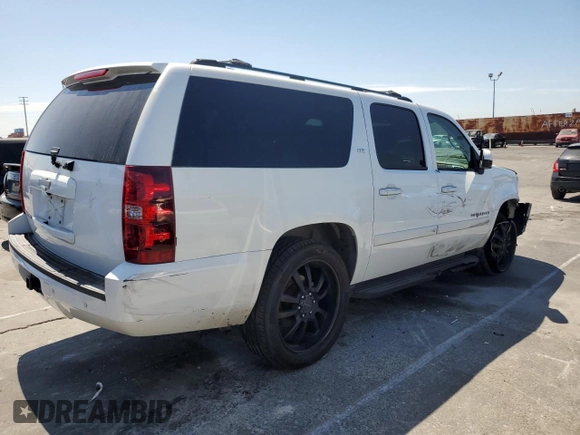 2007 Chevrolet Suburban LT z VIN 1GNFC16J17J183881, wystawiony jako Copart lot #63805785 z przebiegiem 157 331 mil mil oraz Szkoda całkowita • Salvage title. Historia ofert i sprzedaży dostępna na DreamBid. Obrazek 3.