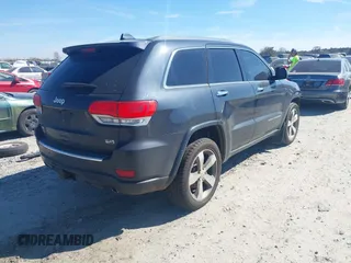 2014 Jeep Grand Cherokee Overland with VIN 1C4RJECG9EC522075, listed as a IAAI auction lot 41683670 with 1 mi miles. Bid and sale history available at carsss.com. Image 4.
