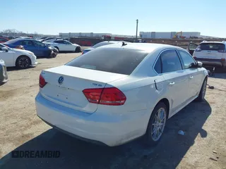2014 Volkswagen Passat TDI SE w/Sunroof with VIN 1VWBN7A32EC016554, listed as a IAAI auction lot 41472156 with 178,149 mi miles. Bid and sale history available at carsss.com. Image 4.