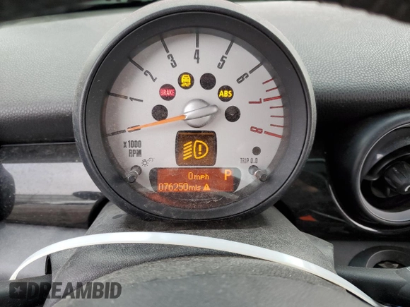 2012 MINI Hardtop S with VIN WMWSV3C59CT385254, listed as a Copart auction lot 52675675 with 76,250 mi miles and Salvage Title. Bid and sale history available at DreamBid. Image 9.