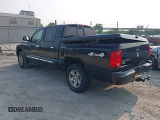 2007 Dodge Dakota SLT z VIN 1D7HW48K97S138512, wystawiony jako IAAI lot #42386042 z przebiegiem 146 629 mil mil oraz . Historia ofert i sprzedaży dostępna na DreamBid. Obrazek 3.