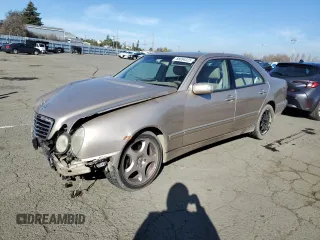 2001 Mercedes-Benz E-Class with VIN WDBJF70J91B263080, listed as a Copart auction lot 88094325 with 193,366 mi miles and Salvage Title. Bid and sale history available at carsss.com. Image 1.