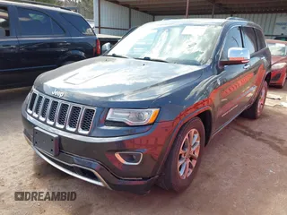 2015 Jeep Grand Cherokee Overland with VIN 1C4RJFCG6FC831641, listed as a IAAI auction lot 41877680 with 143,568 mi miles. Bid and sale history available at carsss.com. Image 17.