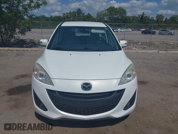 2013 Mazda 5 Touring with VIN JM1CW2CL8D0153437, listed as a IAAI auction lot 42181891 with 118,610 mi miles and . Bid and sale history available at DreamBid. Image 13.